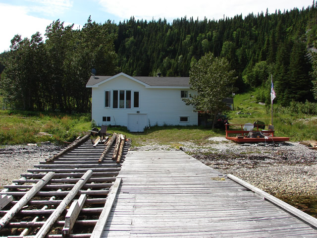 John Reeves' place, at the main wharf at Canada Harbour. When he was building his cabin, about 20 years ago, Mr Reeves uncovered a French fisherman, buried in the beach stones, in Christian fashion, facing east, with hands crossed.